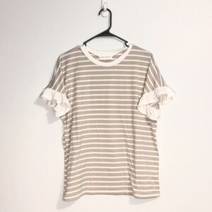 Large women's blouse with ruffle sleeves